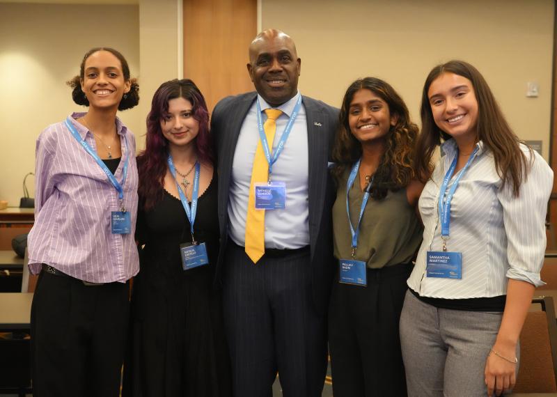 Students posing with Vice Chancellor Monroe Gorden